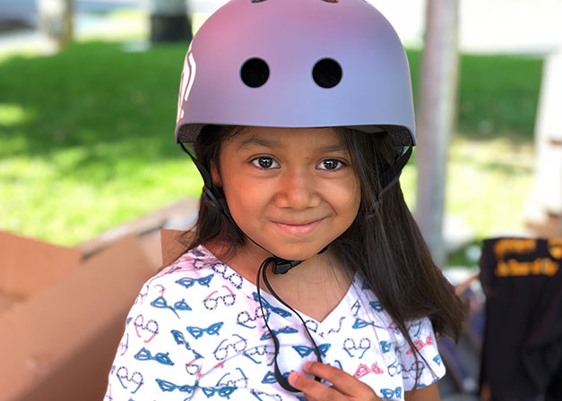 girl with bike helmet on