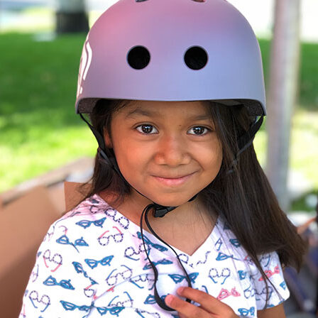 girl with bike helmet on